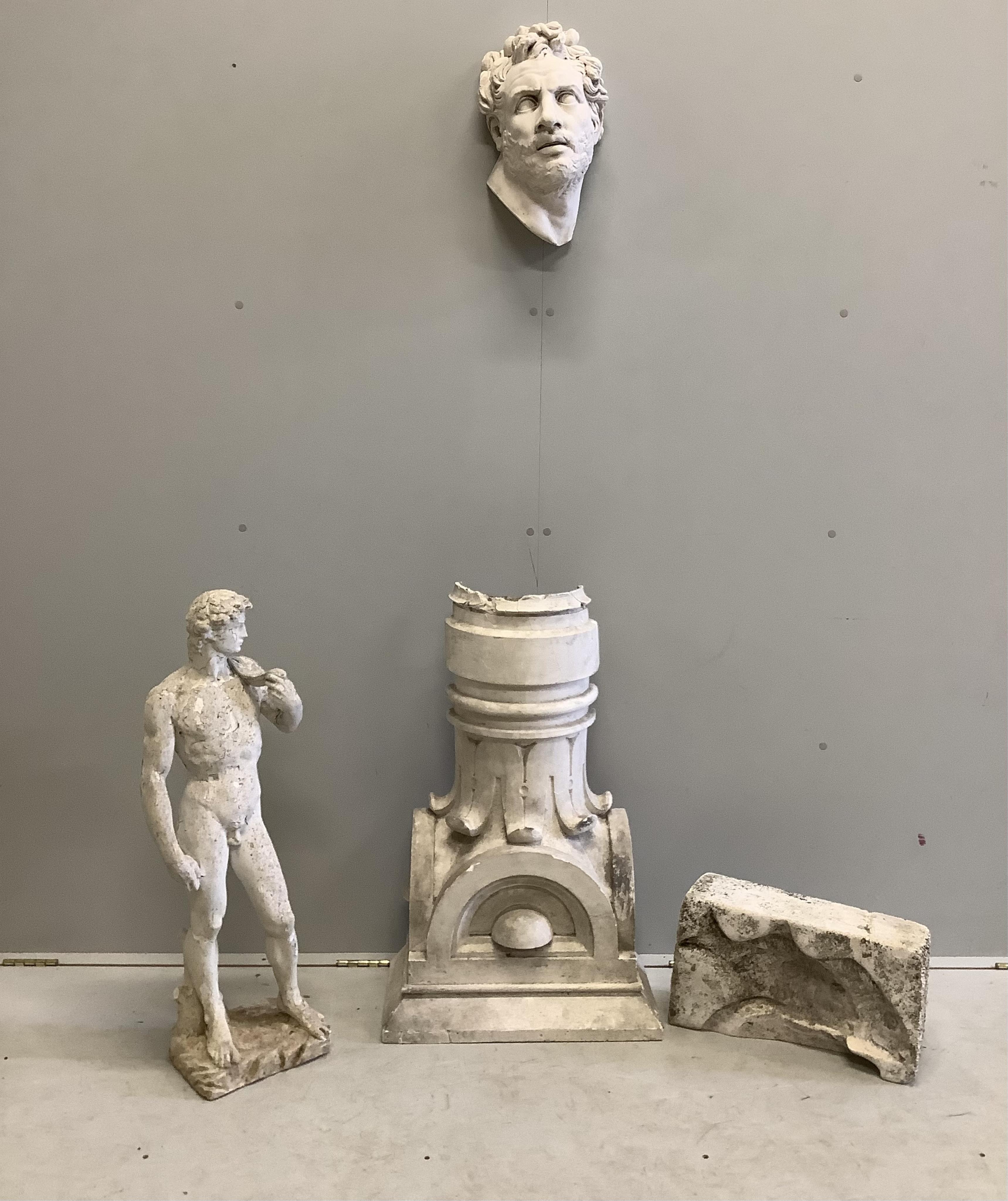 A plaster figure and three other items, largest height 76cm. Condition - poor to fair